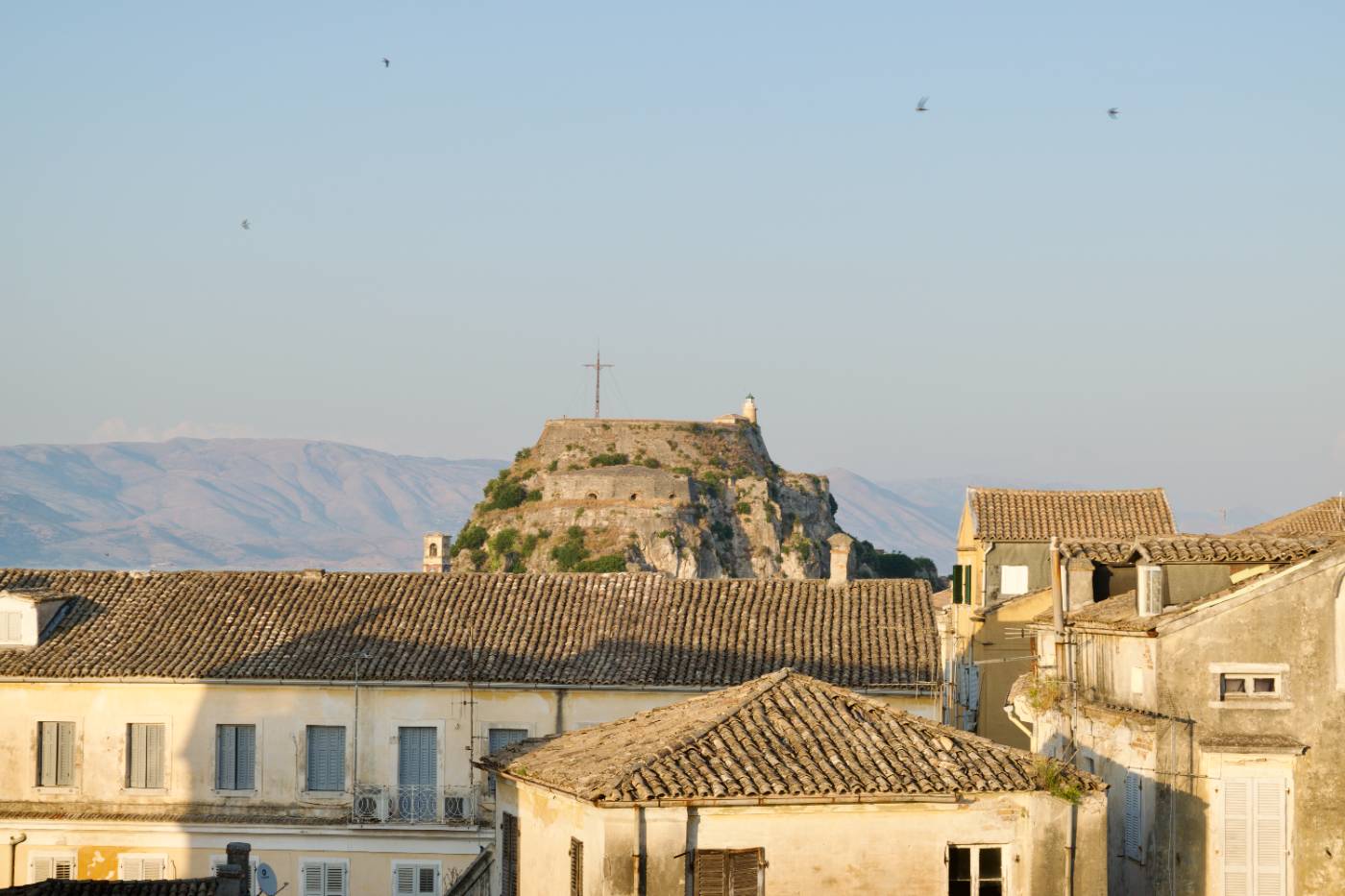 The Old Fortress seen over the rooftops of Corfu Old Town